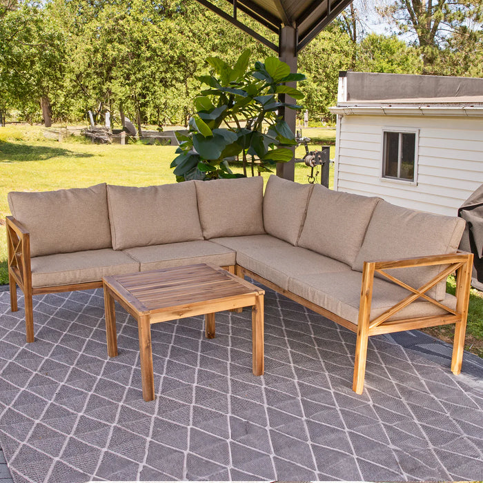 L-shaped acacia wood patio sectional sofa set on backyard deck with coffee table