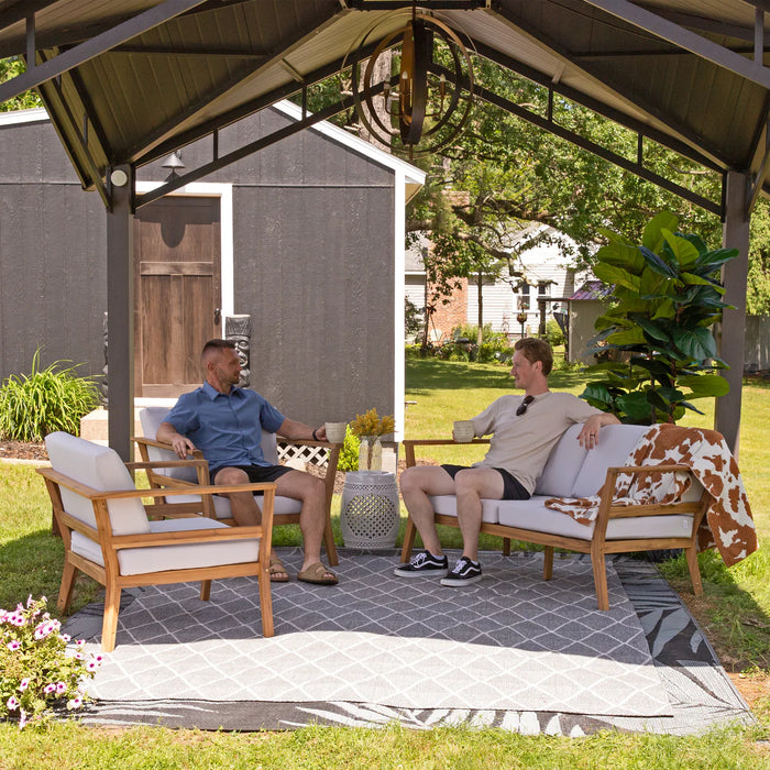 3-piece acacia wood patio furniture set on backyard porch with cushions